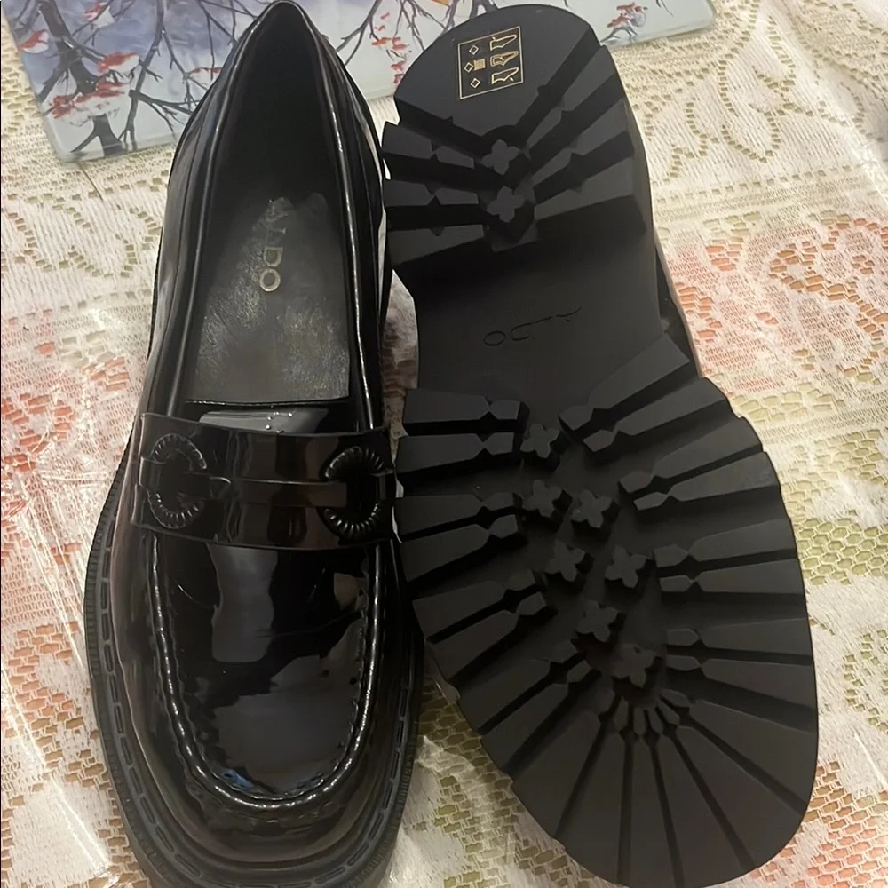 Aldo Glossy Black Patent Slip-On Loafers with Ring Accent